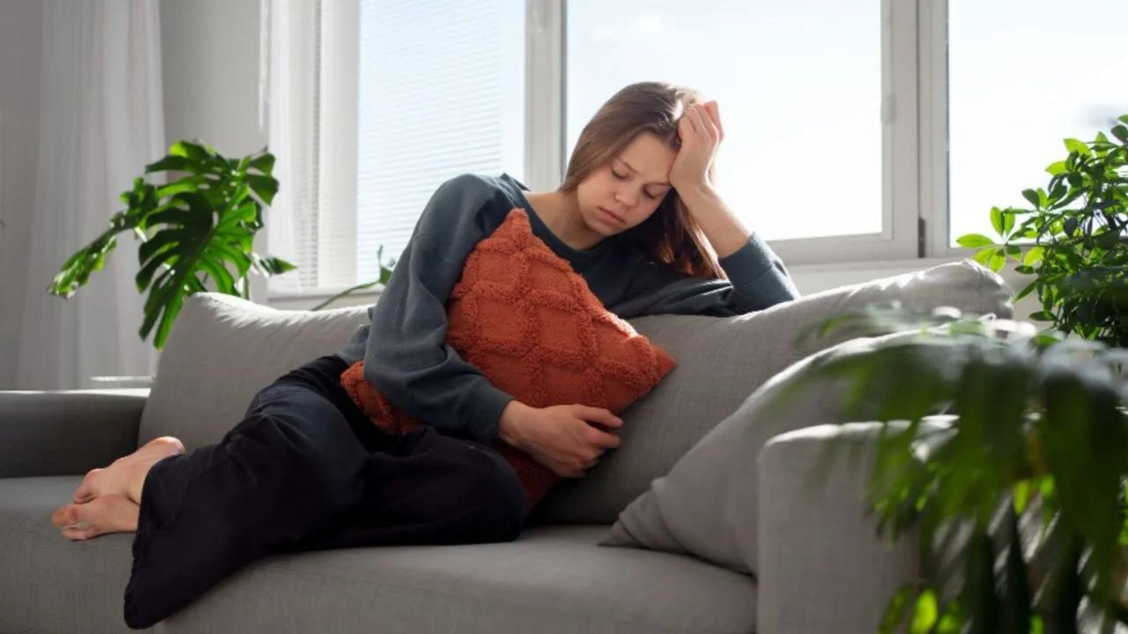 A Woman sitting on a Sofa